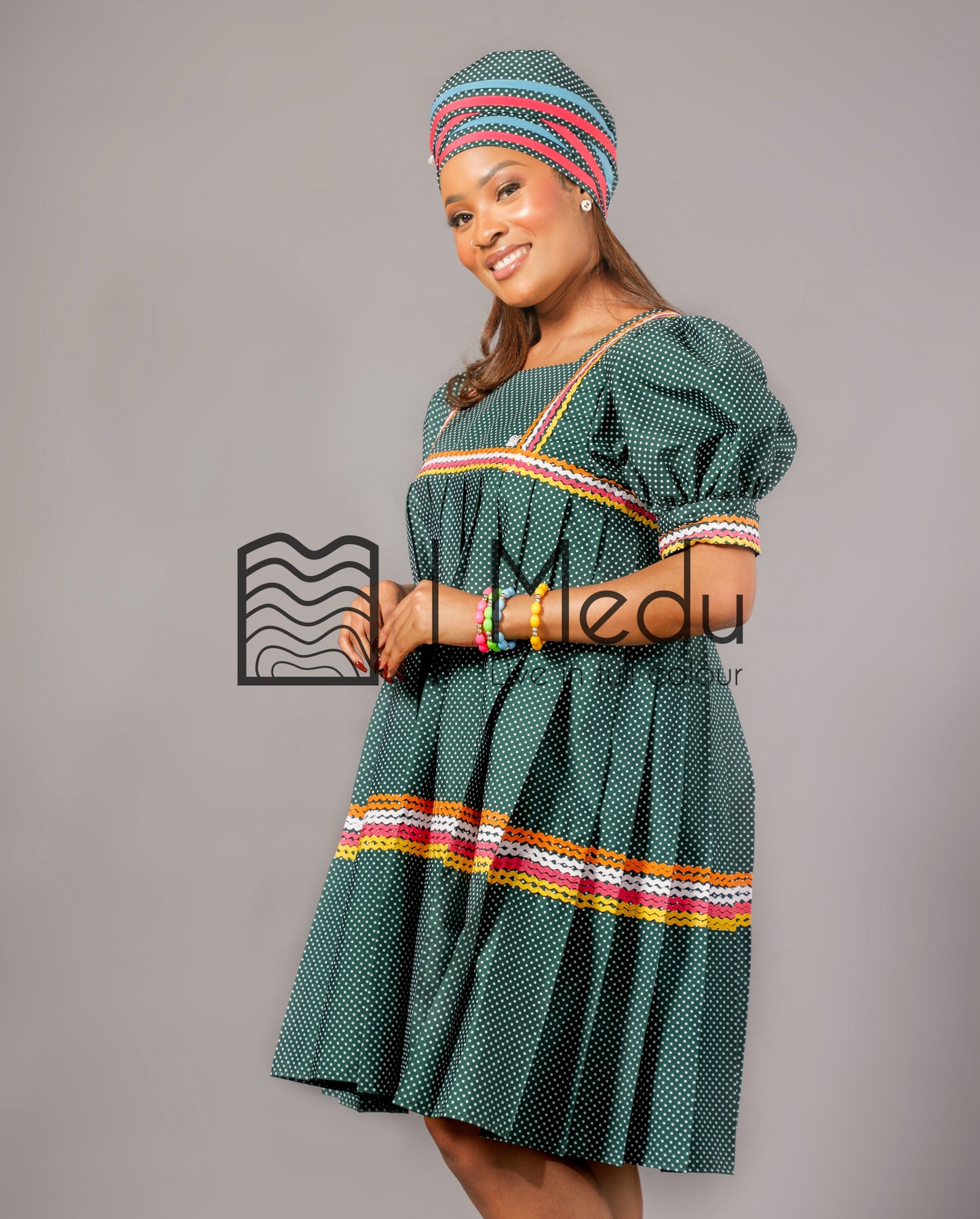 Kwena Pleated Yele Dress In Bottle Green