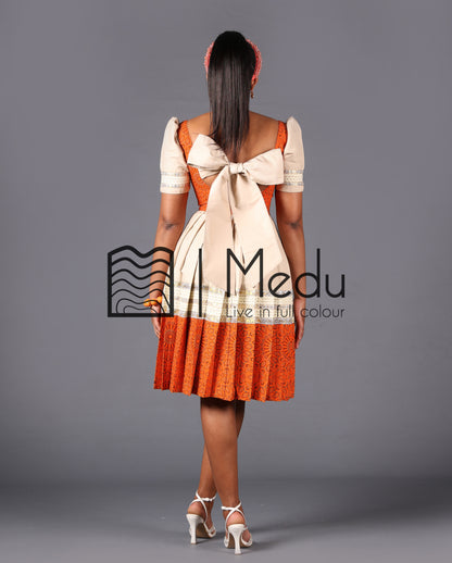 Mmashela Giant Bow Midi Dress in Beige and Orange
